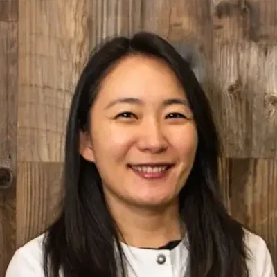 A headshot photo of dentist Dr. Anna Hsu from El Camino Dental Arts