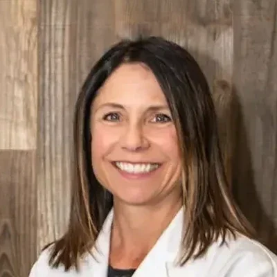 A headshot photo of dentist Dr. Debra Edson from El Camino Dental Arts