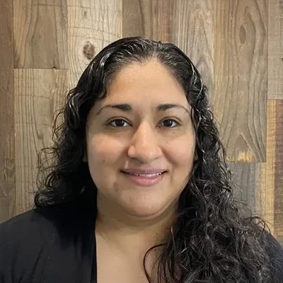 A headshot photo of registered dental hygienist Maria from El Camino Dental Arts